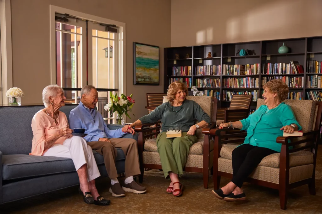 woodbridge-terrace_lifestyle_residents-socializing-in-library